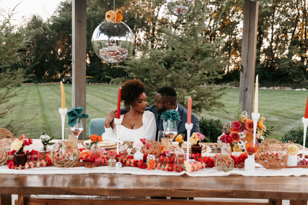 Colorful head table with disco balls